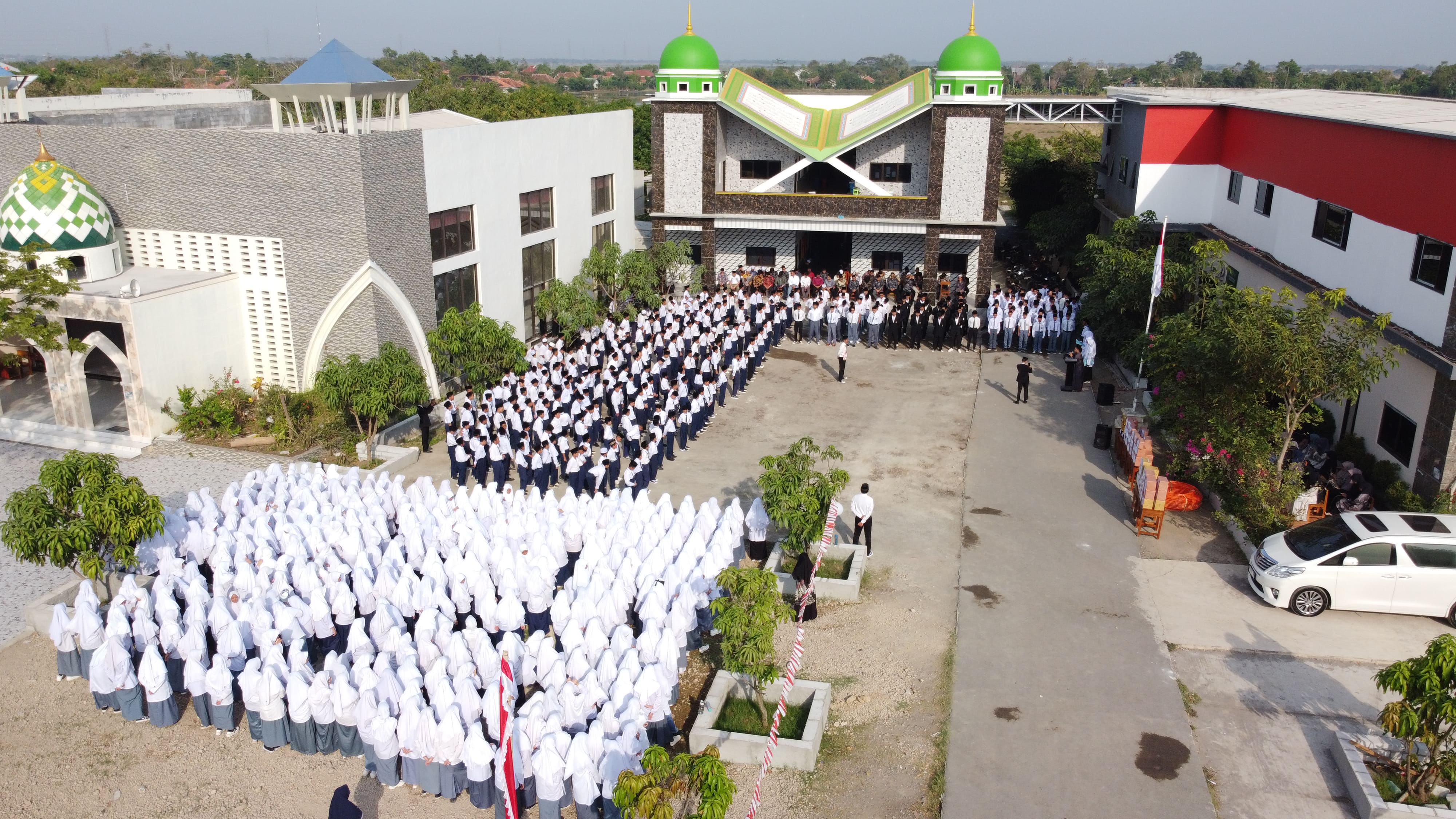 Student reading Quran in a peaceful mosque environment