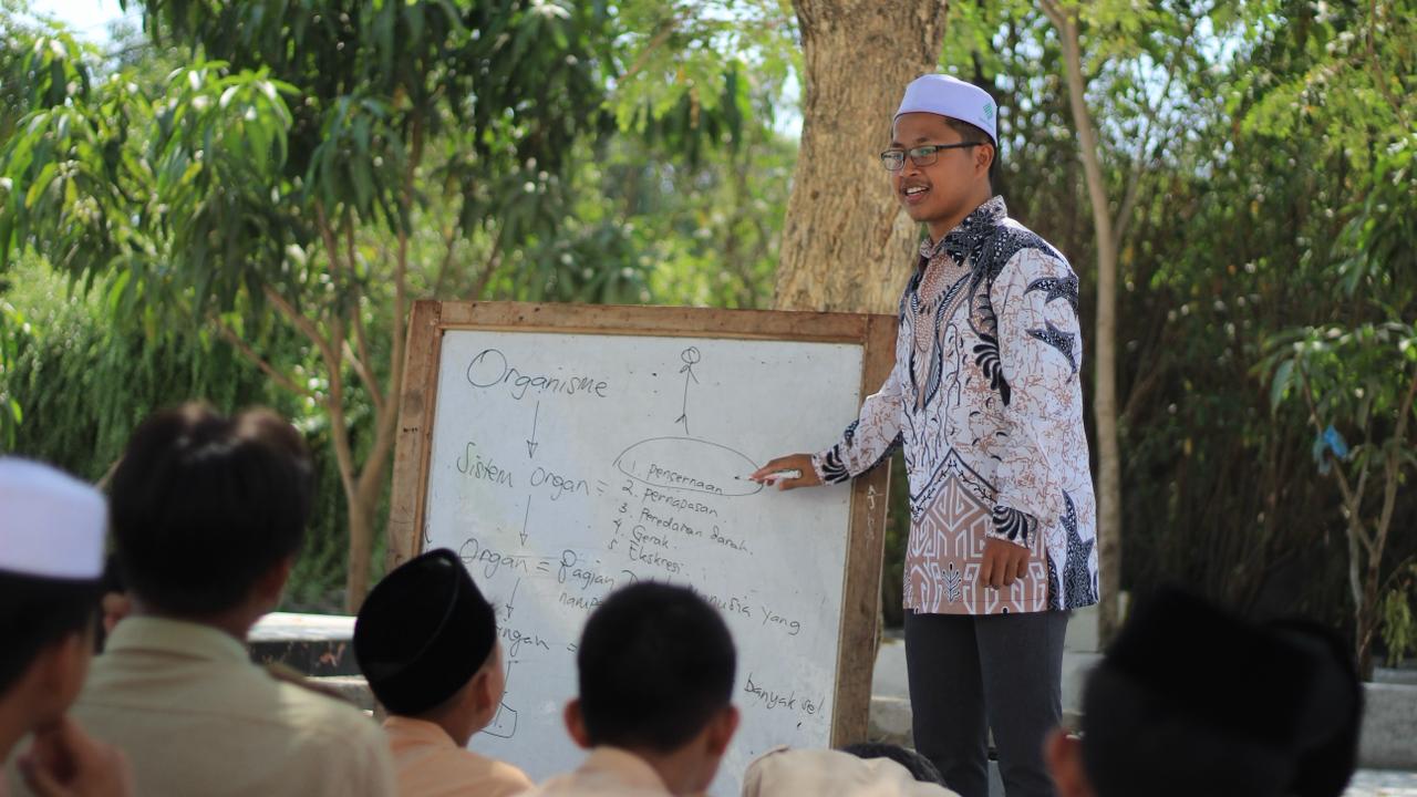 Students in uniform attending formal class